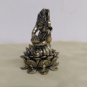 Side view of 3.15 inch antique brass Ganesha idol