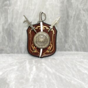 Close-up of antique sword and shield metal design POZHI Decor